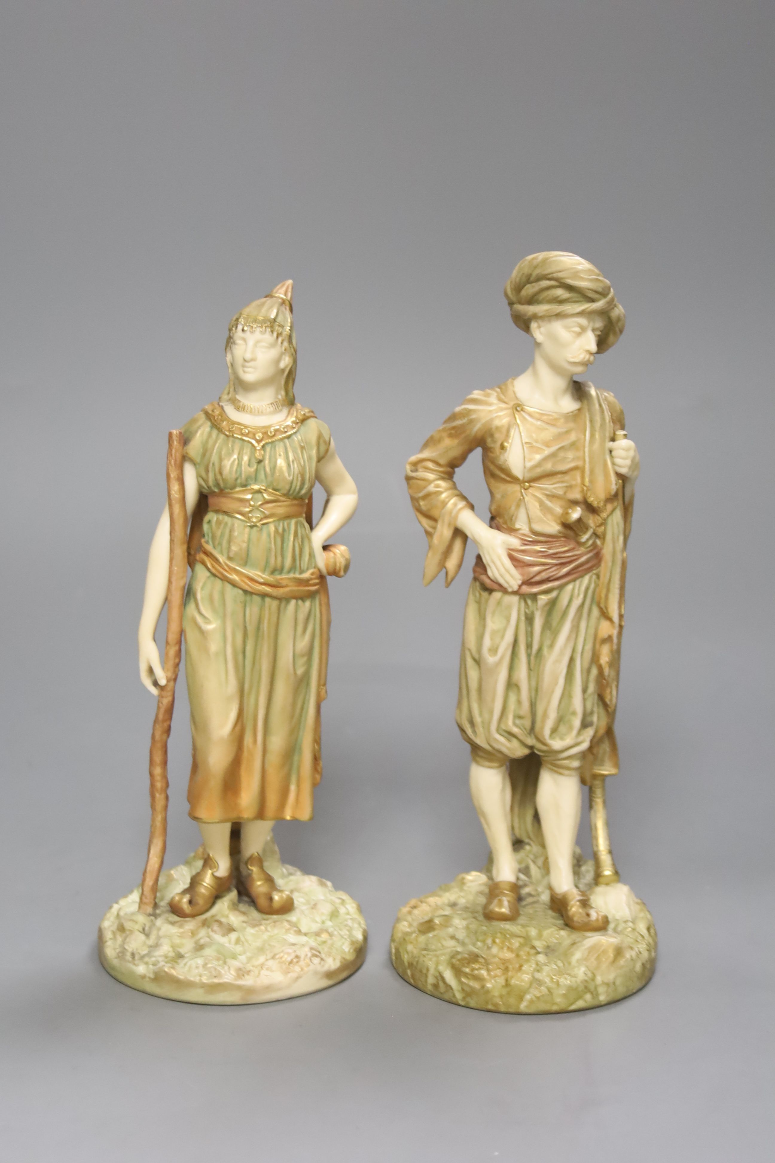 A pair of Royal Worcester blush figures of Bringaree Indians, 1893, height 23cm